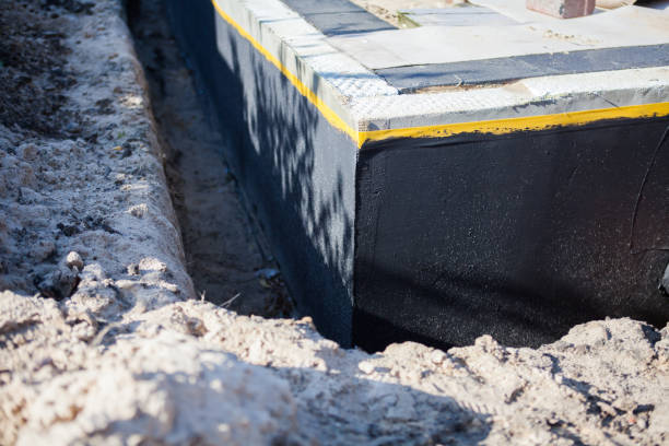 Professional Emergency Waterproofing technician working in Marietta, PA